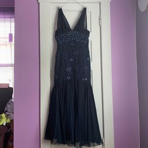 We have a Dress that’s only been worn once. No tags.